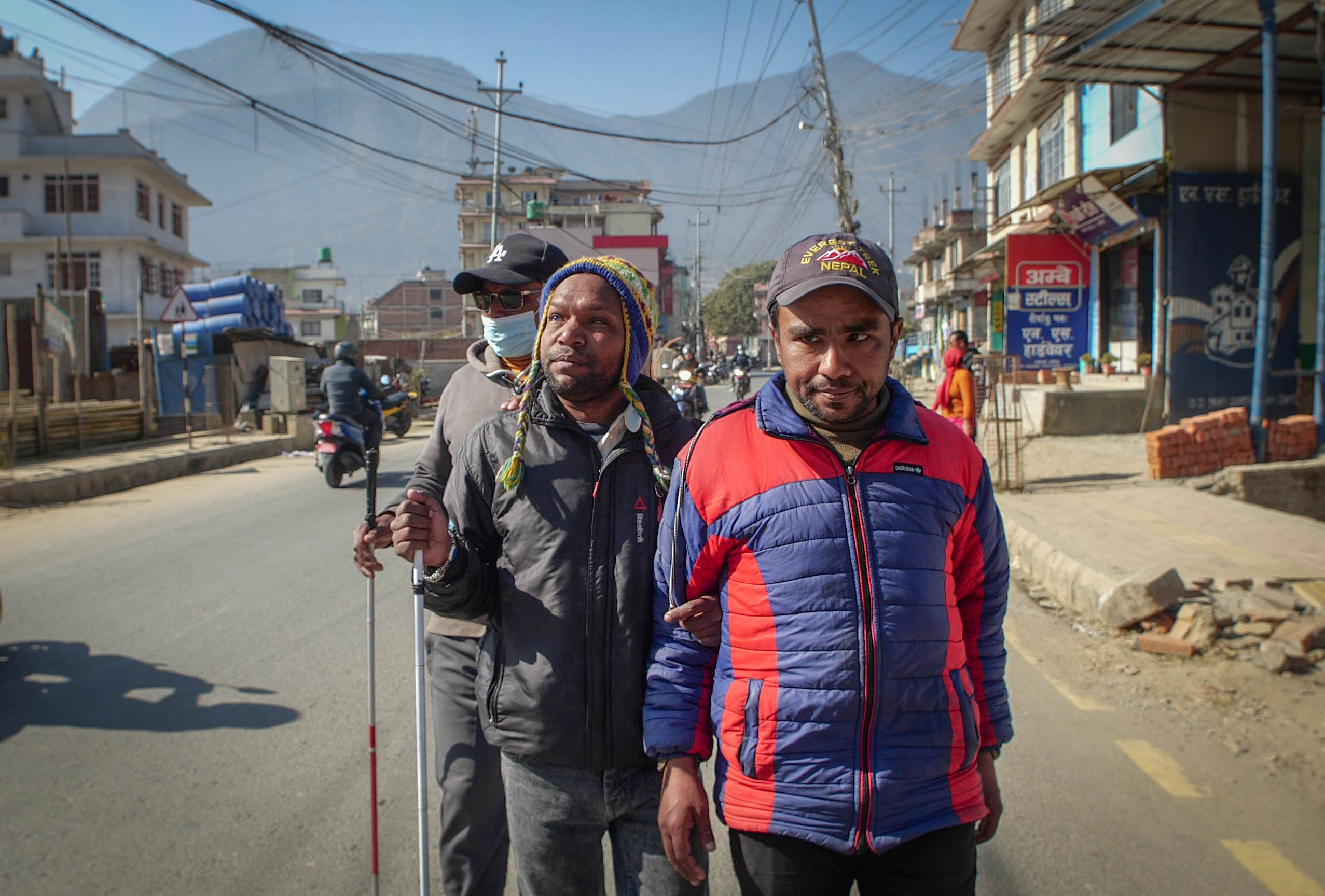 Blind walking in the street.jpg